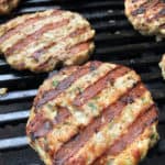 turkey burgers with grill marks on grill