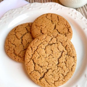 three ginger cookies on white plate