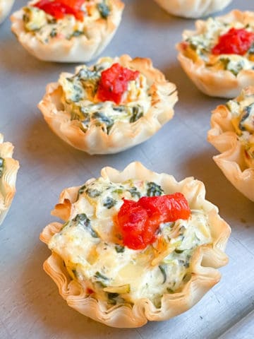 spinach artichoke tarts in phyllo cups