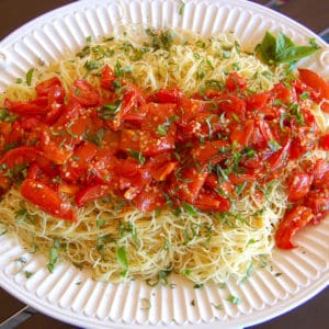 tomato confit over angel hair pasta with fresh basil